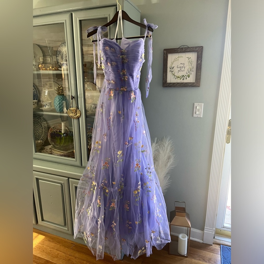 Woman’s Lilac embroidered floor length gown